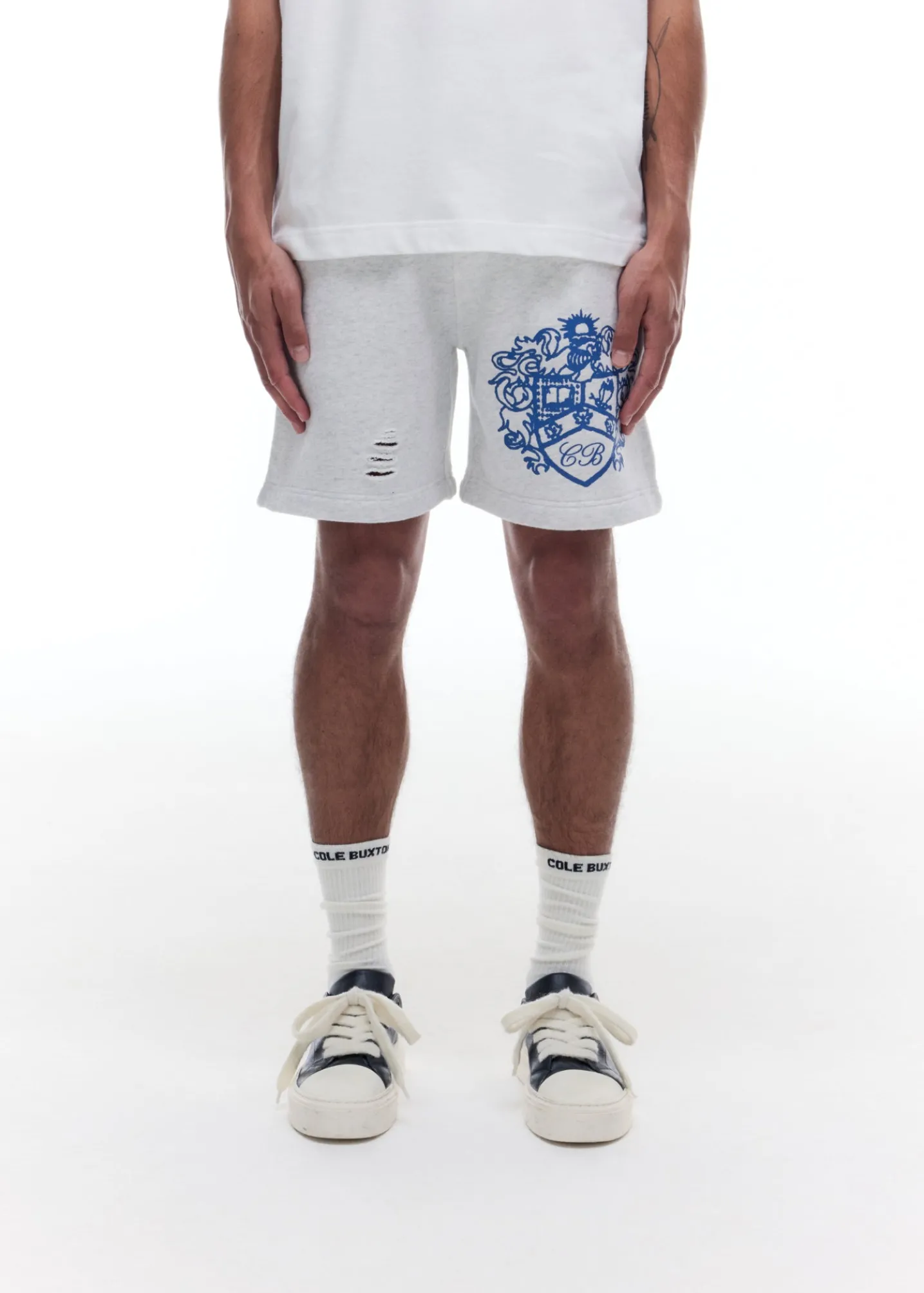 DISTRESSED COLLEGIATE CREST SHORTS