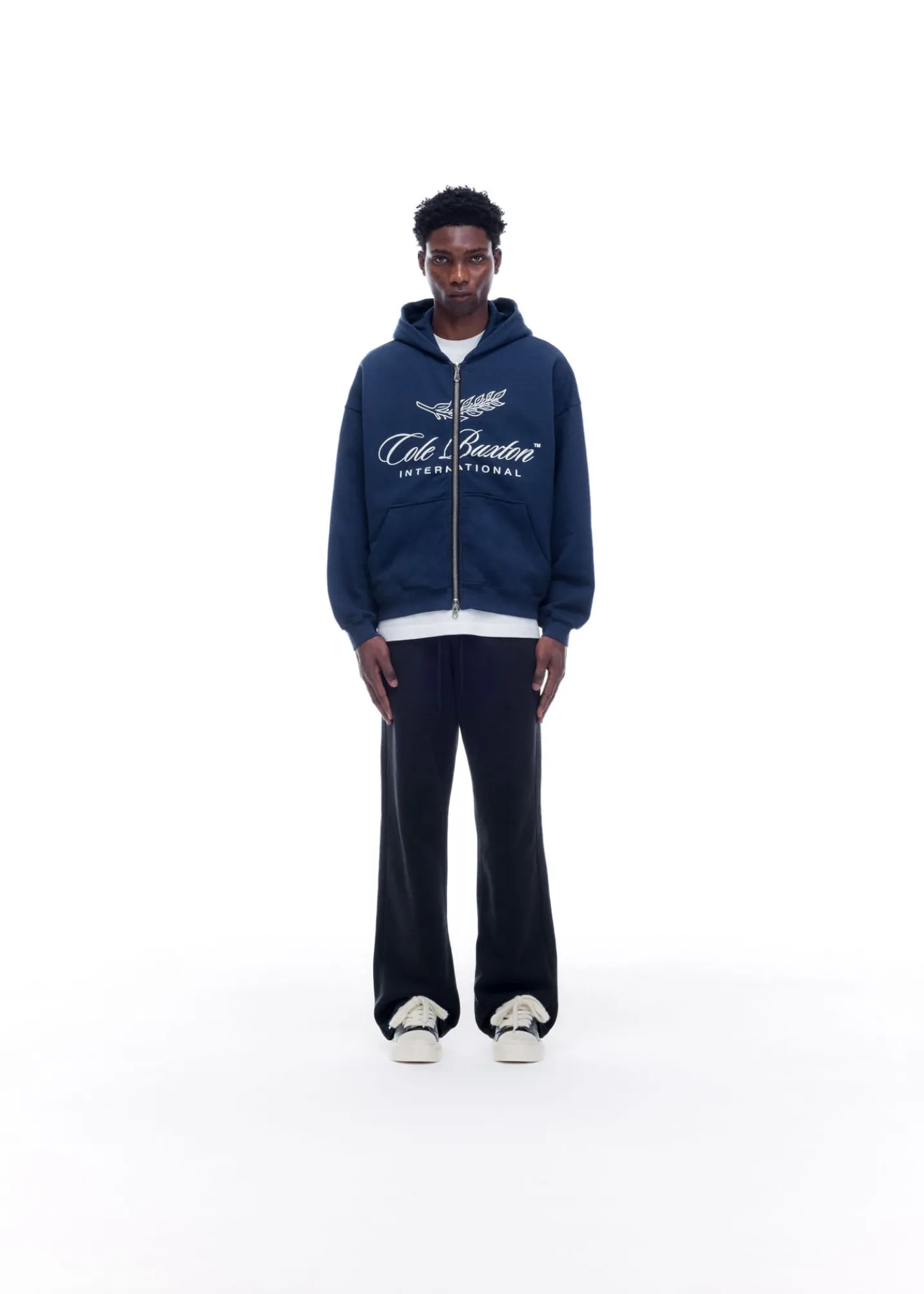 INTERNATIONAL ZIPPED HOODIE