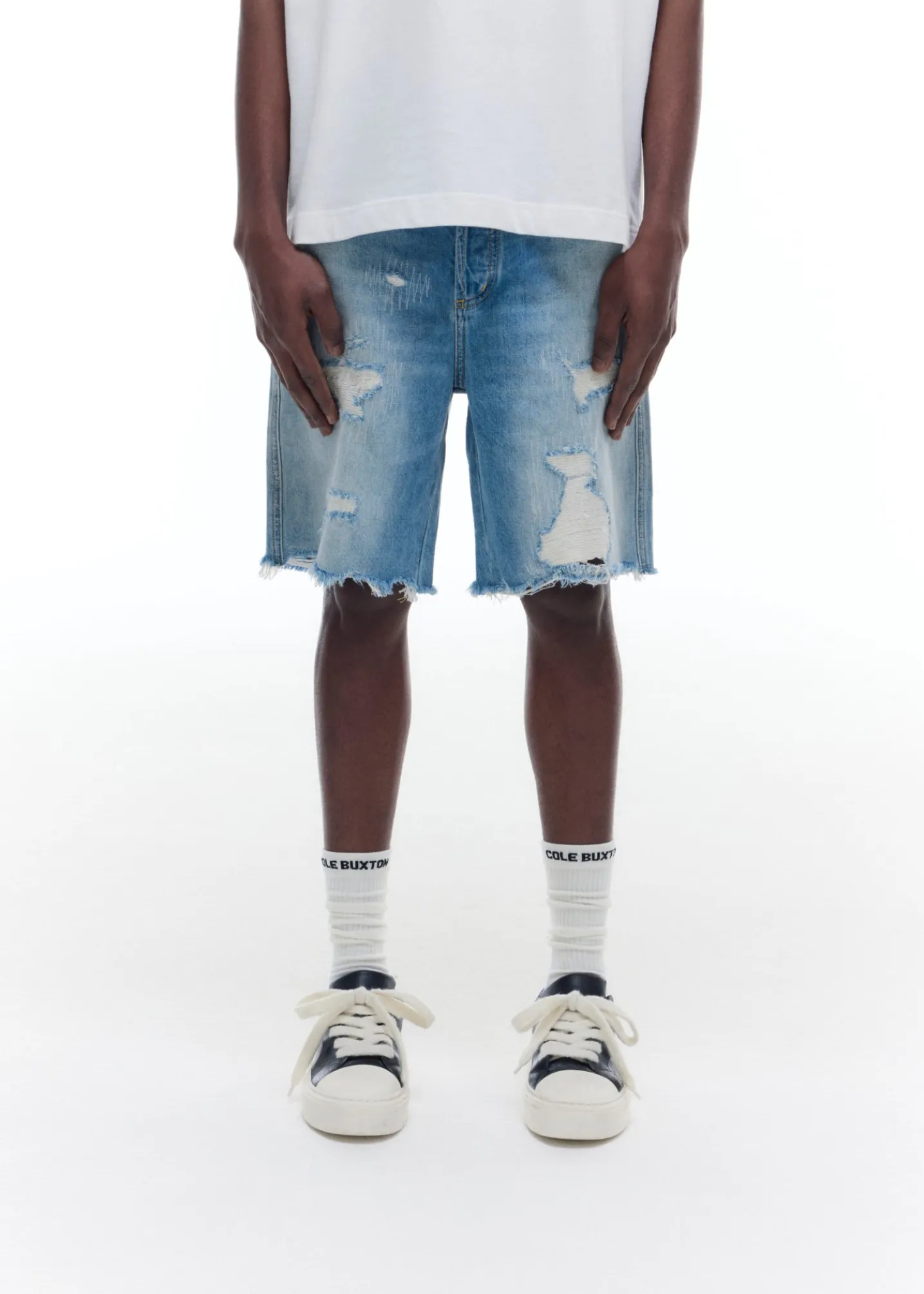REPAIRED DENIM SHORTS